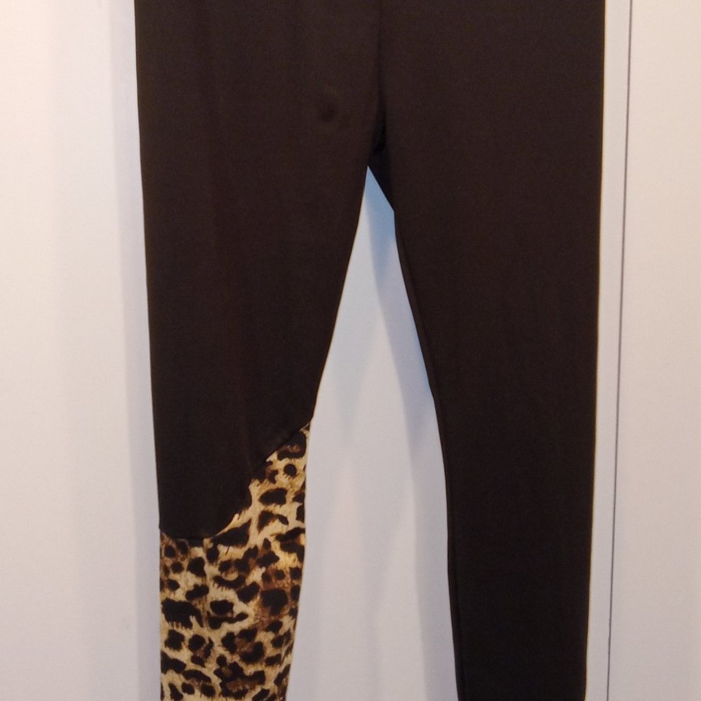 leggings , black with animal print on one leg